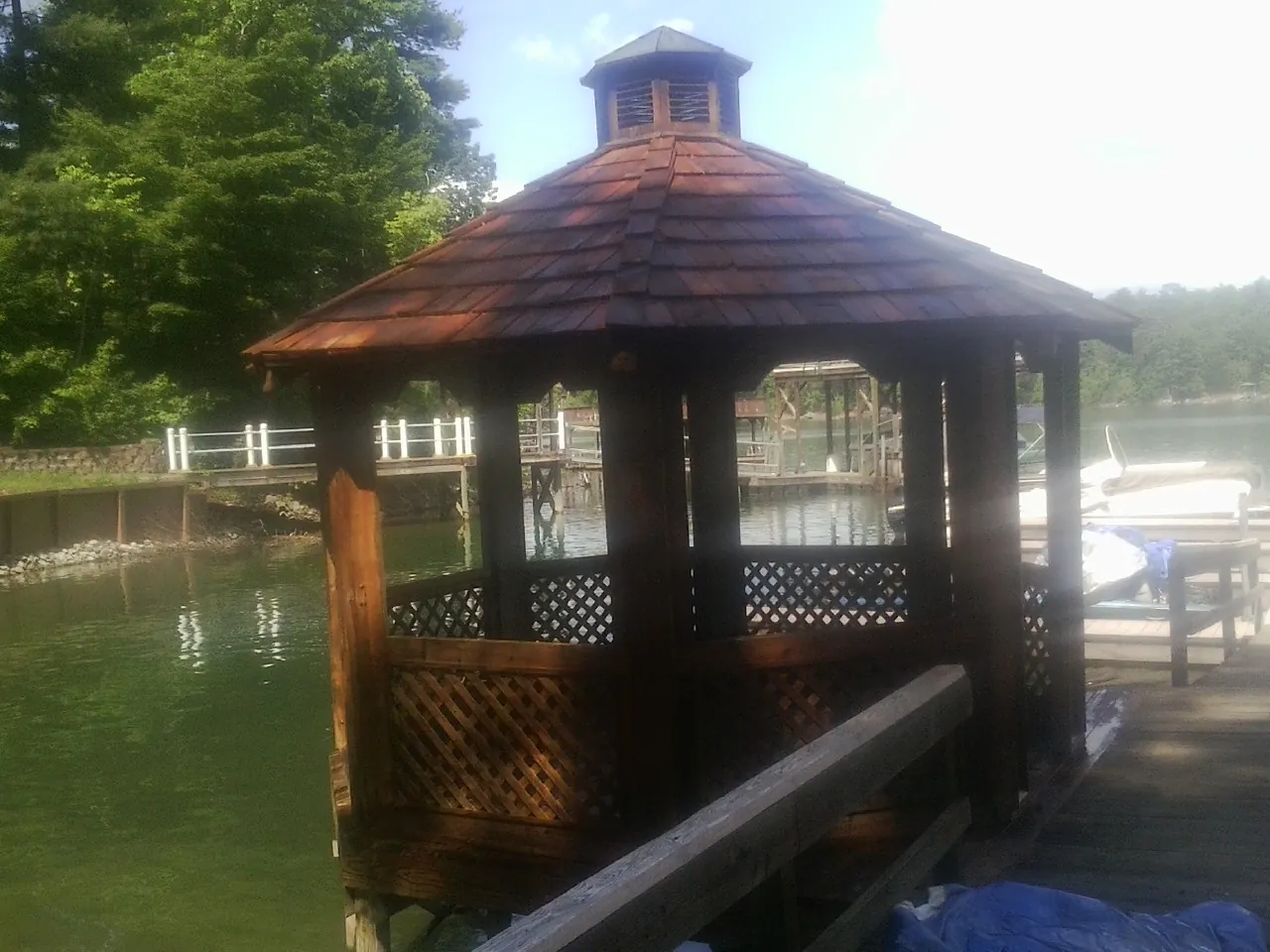 Cedar shake gazebo roof rebuilt on a lake dock in Stone Harbor